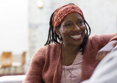 Woman smiling at friend