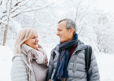 Smiling Senior Couple in Snow